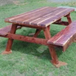 Handcrafted Cedar picnic tables with natural wood grain finish, built in the USA for outdoor durability.