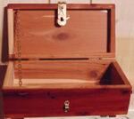handcrafted wooden jewelry box with hinged lid
